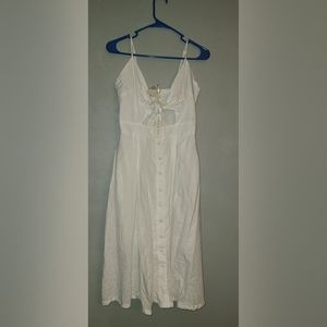 Supper cute white dress with front chest tie. New with tags size large